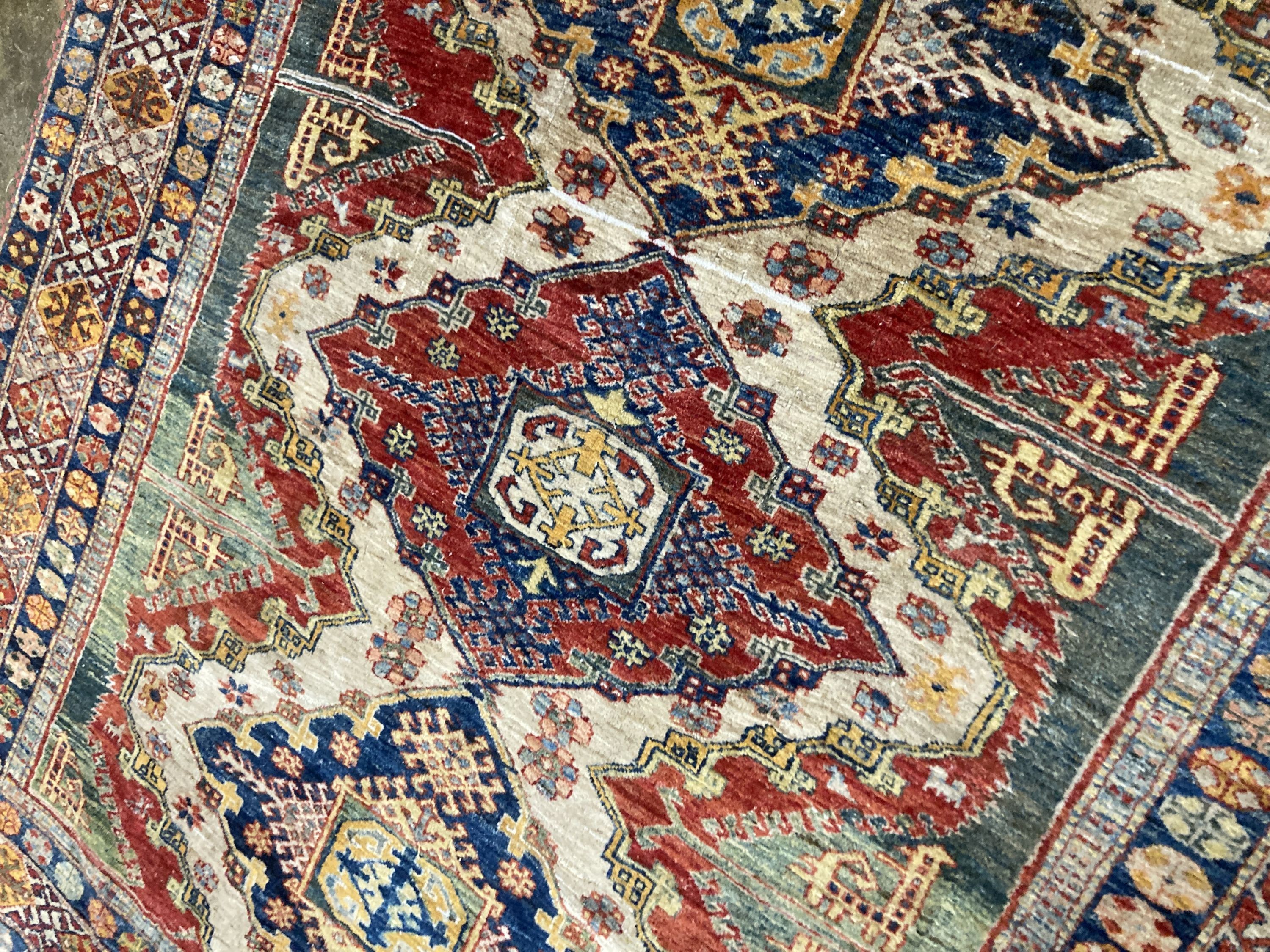 A Caucasian design carpet, 200 x 220cm